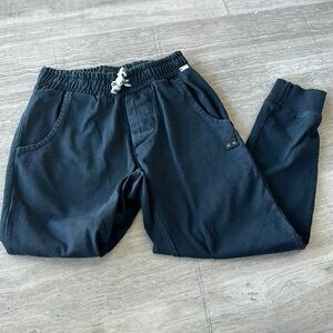 Munster once worn black sweatpants